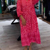 Carmilla - Elegantes Kleid mit lebendigem Print