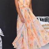Ava | Langes Kleid mit Blumenprint und Neckholder-Ausschnitt