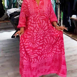 Carmilla - Elegantes Kleid mit lebendigem Print