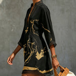 Ladina – Schwarzes Tunika-Kleid mit Goldprint