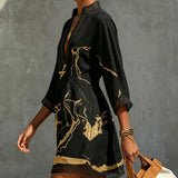 Ladina – Schwarzes Tunika-Kleid mit Goldprint
