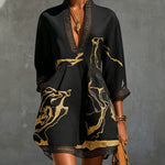 Ladina – Schwarzes Tunika-Kleid mit Goldprint