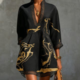 Ladina – Schwarzes Tunika-Kleid mit Goldprint