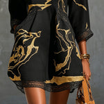 Ladina – Schwarzes Tunika-Kleid mit Goldprint