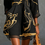 Ladina – Schwarzes Tunika-Kleid mit Goldprint