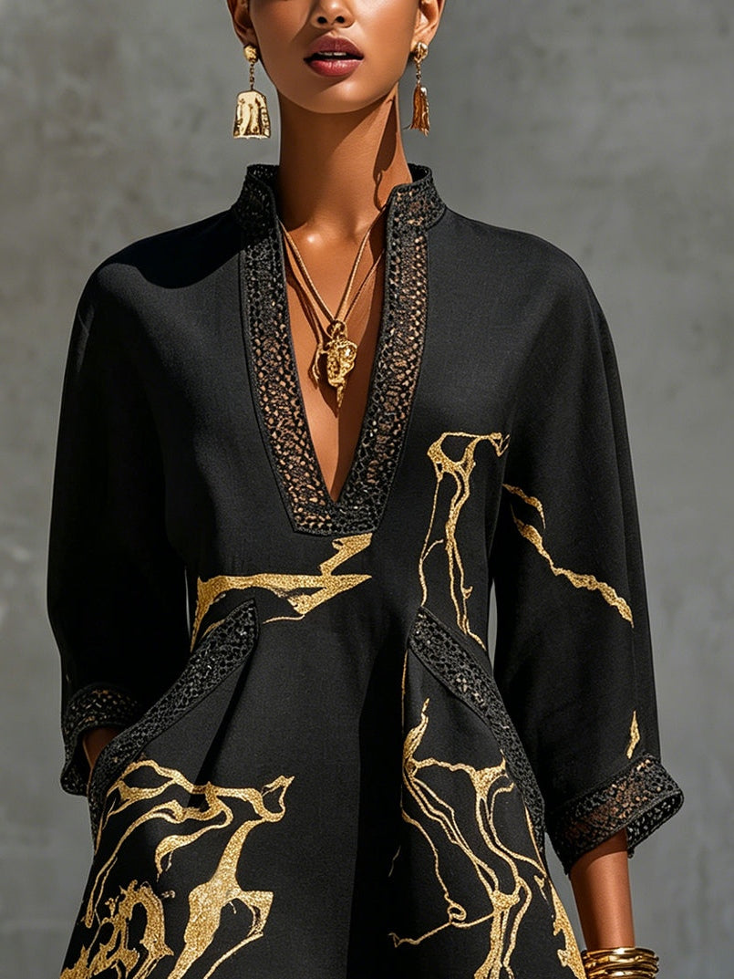 Ladina – Schwarzes Tunika-Kleid mit Goldprint