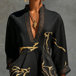 Ladina – Schwarzes Tunika-Kleid mit Goldprint