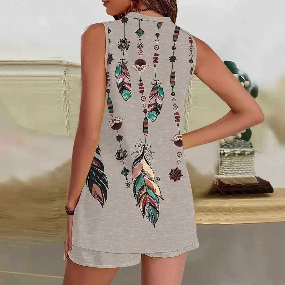 Vilma – Beiges Kleid mit Federprint