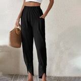 Essari - trousers with slit at the hem